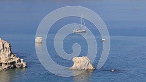 Aerial view of beautiful yacht. Boat on the sea at sunset in summer.