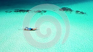 Aerial view of the beautiful young woman sea Water play with waves at Crystal clear water. Summer holiday idy