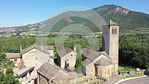 Aerial view of bell tower and apse of the Mozarab Pre-Romanesque or Romanesque Church of San Pedro de Larrede in the