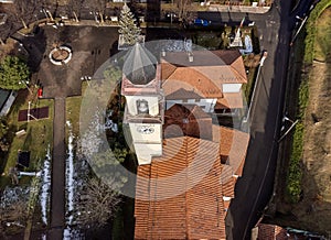 Aerial view of the bell tower of the Ippolito and Cassiano church in Cassano Valcuvia, province of Varese, Italy photo