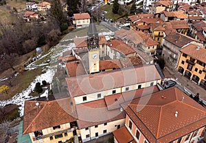 Aerial view of the bell tower of the Saint Ilario di Poitiers Church in Bedero Valcuvia, province of Varese, Italy photo