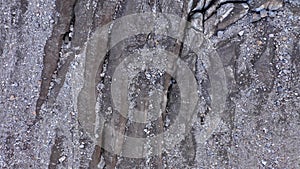 Aerial view of Belvedere glacier, deep and old crevasses, ice in belvedere valley, around mountains