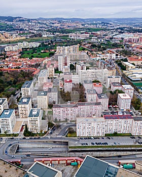 Aerial view of Benfica residential district at twilight, view of white building, Lisbon, Portugal