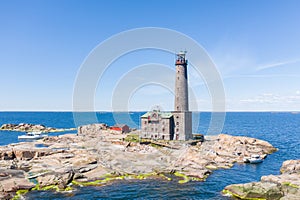 BengtskÃÂ¤r lighthouse in Gulf of Finland in summer. photo