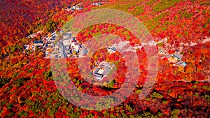 Aerial view of Beomeosa temple in Busan South korea.Image consists of temple located between the mountain covered with colorful