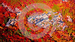 Aerial view of Beomeosa temple in Busan South korea.Image consists of temple located between the mountain covered with colorful