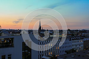Aerial view of Berlin cityscape rooftop in summer sunset