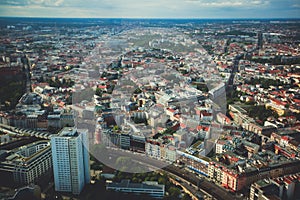 Aerial view of Berlin with skyline and scenery beyond the city, Germany, seen from the observation deck of TV tower