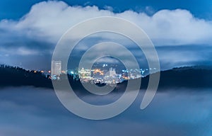 Aerial view of Betong city skyscraper view through misty mountain, Yala, Thailand