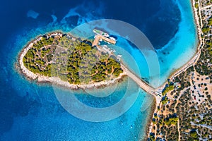 Aerial view of beutiful small island in sea bay at sunny day