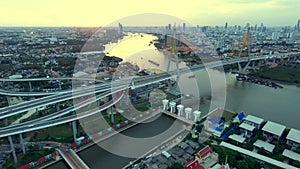 Aerial view of bhumiphol bridge crossing chaopraya river important landmark and traffic and land transportation in bangkok thailan