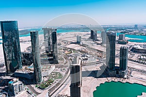 Aerial view of big modern city | Abu Dhabi city Al Reem Island | Middle East travel destinations | United Arab Emirates