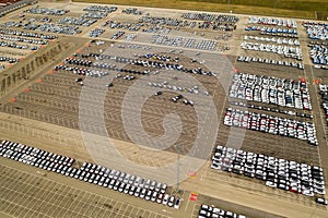 aerial view of big parking lot of new cars from car factory in slovakia zilina kia 08.03.2020