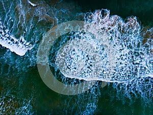 Aerial view of Big Waves crashing in the ocean,Sea surface ocean waves background,Top view waves background