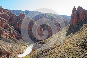 Aerial View of Binggou Danxia Canyon Landform in Zhangye, Gansu Province, China. Sharp Pointy Peaks in the Geopark. Road