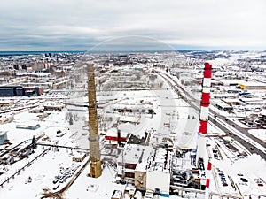 Aerial view of biofuel boiler-house plant facilities with steaming chimneys on winter day in Klaipeda, Lithuania