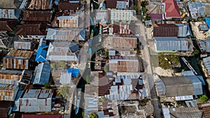 Aerial view or bird view of village with many wooden boats are docking