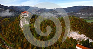 Aerial view of Blejski Grad, castle built on top of a rock. Slovenia.