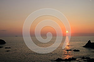 Aerial view of the Bloods Islands and Parata Tower, the Genoese tower built in 1608, Corsica. France. Sunset over the sea on the