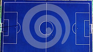 Aerial view of blue artificial turf futsal field