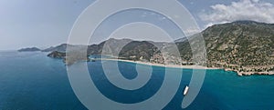 Aerial view of Blue Lagoon with beautiful mountains in the background. Oludeniz, Fethiye, Turkey.