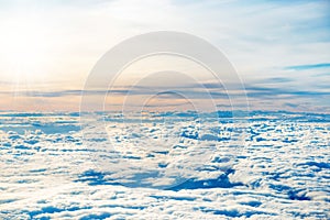 Aerial view of blue sky with layers of white clouds