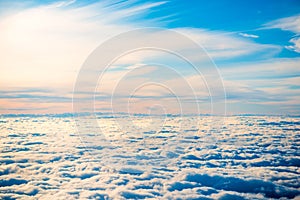 Aerial view of blue sky with layers of white clouds
