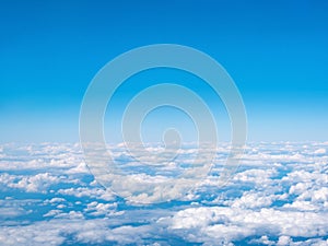 Aerial view of blue sky and white Clouds. Top view from airplane