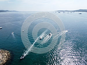 Aerial view on blue water of Gulf of Saint-Tropez and sailboats near Port Grimaud and port Cogolin, French Riviera, Provence,