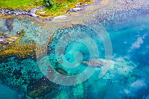 Aerial view of blue water with shore in Norway