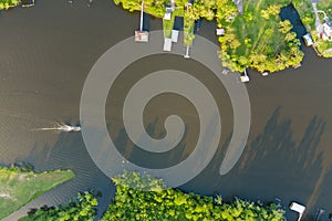 Aerial view of a boat on Dog River in Theodore, Alabama