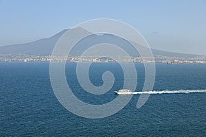 Aerial view of boat in Gulf of Naples Golfo di Napoli, Gurfo `e Napule with Mount Vesuvius Monte Vesuvio, Muntagna Vesuvio at photo