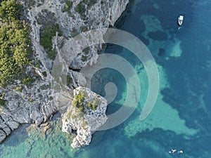 Aerial view of a boat moored near the coast of the island of Corfu, Greece