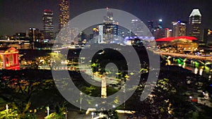 Aerial view of Boat Quay and Singapore skyline from Cavenagh Bridge at night