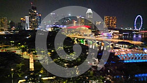 Aerial view of Boat Quay and Singapore skyline from Cavenagh Bridge at night