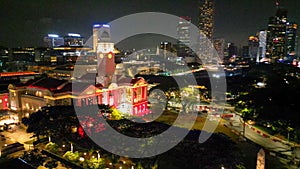 Aerial view of Boat Quay and Singapore skyline from Cavenagh Bridge at night