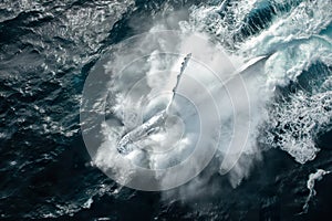 Aerial view of a boat sailing through the vast ocean