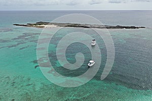 Aerial view of boats anchored in Honeymoon Harbour, Gun Cay, Bahamas.