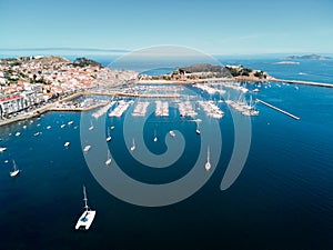 Aerial View of Boats in Baiona Harbour and Fort