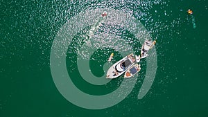 Aerial view on boats resting at sunny harbour. Waiheke Island, Auckland, New Zealand