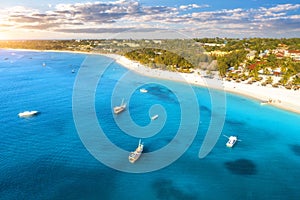 Aerial view of boats and yachts on the tropical sea coast