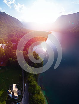 Aerial view of the Bohinj lake. Travel and tours concept. landscape ot the Triglav national park, summer forest and the church of