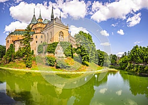 Aerial view of Bojnice medieval castle, UNESCO heritage in Slovakia Slovakia landscape travel. concept. Romantic castle.