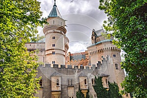 Aerial view of Bojnice medieval castle, UNESCO heritage in Slovakia Slovakia landscape travel. concept. Romantic castle.