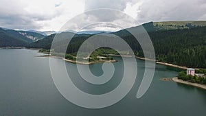 Aerial view of Bolboci lake and Bucegi mountains, Romania