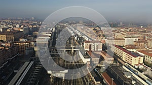 Aerial view of Bologna Centrale railroad station within cityscape, Italy photo