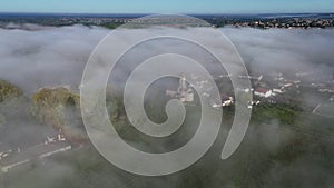 Aerial view of Bordeaux vineyard at spring under fog, Loupiac, Gironde, France