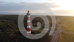 Aerial view of the Bornrif Lighthouse in the countryside of Ameland, the Netherlands at sunset