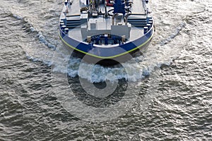 Aerial view bow wave of a cargo ship