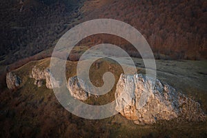 Aerial view of bride standing on a cliff